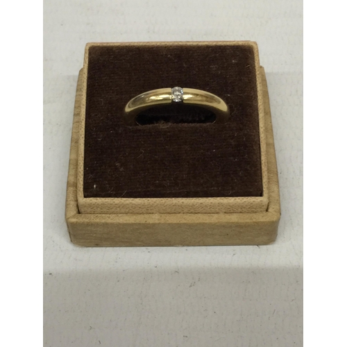 512 - AN 18CT GOLD DIAMOND RING - SIZE J