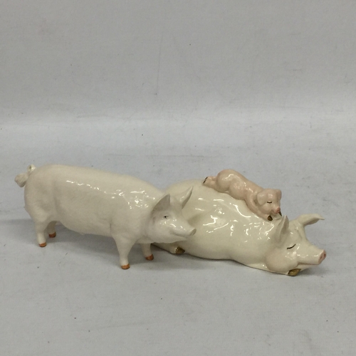 749 - TWO BESWICK PIGS