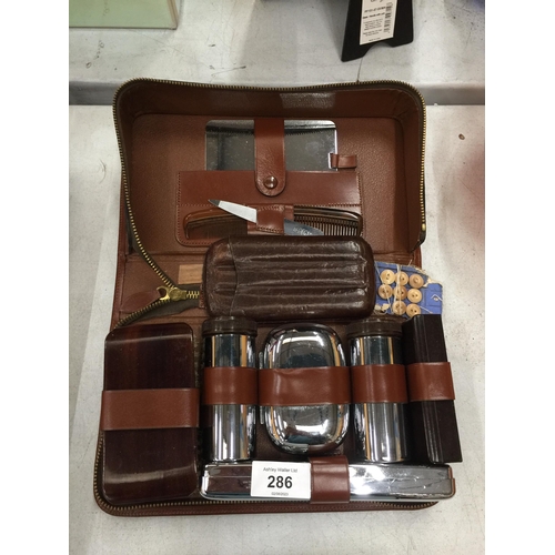 286 - A GENTLEMEN'S GROOMING KIT IN A LEATHER CASE