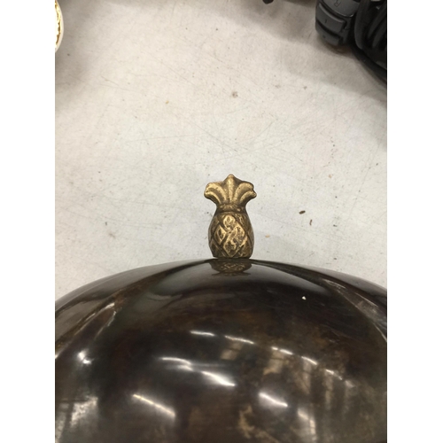 475 - A VINTAGE METAL TEA CADDY WITH FOLIATE ETCHING TO THE BASE AND A PINEAPPLE FINIAL