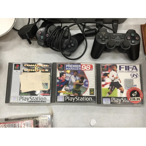 476 - A SONY PLAYSTATION ONE WITH TWO CONTROLLERS AND FIVE GAMES TO INCLUDE STAR WARS THE PHANTOM MENACE, ... 