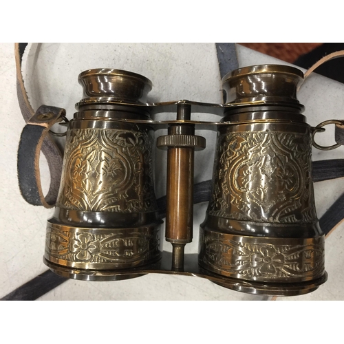 486 - A PAIR OF LEATHER CASED BRASS BINOCULARS