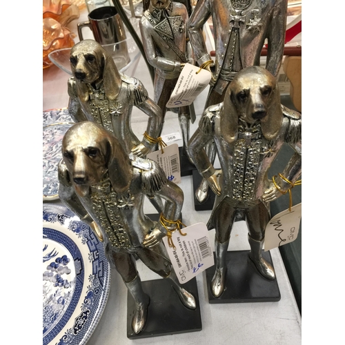 487 - FIVE SILVER COLOURED FIGURES WITH DOG'S HEADS HEIGHT 30CM