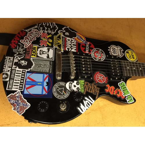 802 - AN EPIPHONE SPECIAL II BLACK ELECTRIC GUITAR WITH STICKERS, SHOULDER STRAP AND CASE