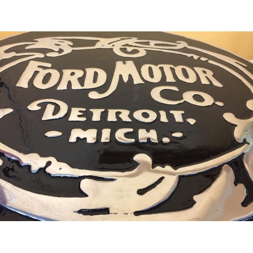 806 - A LARGE BLACK AND CHROME 'FORD MOTOR CO., DETROIT, MICH' SIGN DIAMETER 50CM