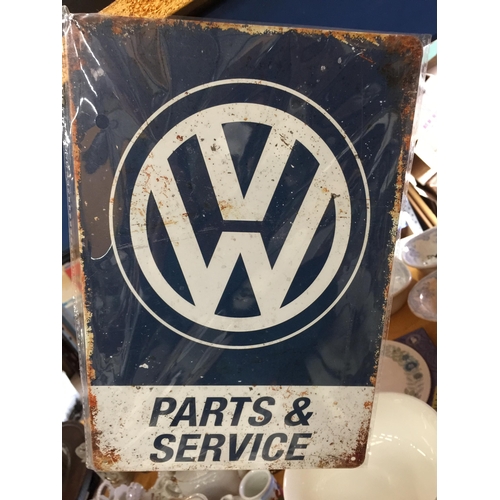 819 - TWO TIN VW SIGNS 20CM X 30CM