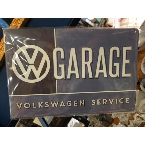 819 - TWO TIN VW SIGNS 20CM X 30CM