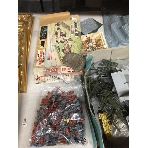 960 - A LARGE GROUP OF ARMY RELATED TOYS, MODEL PLANES ETC