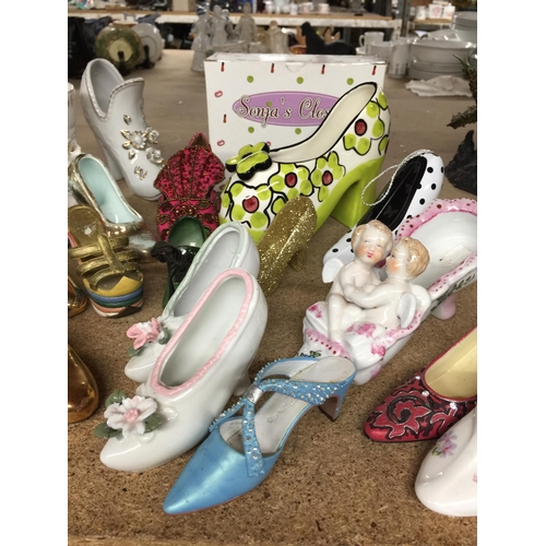 969 - A GROUP OF CERAMIC SHOES ETC