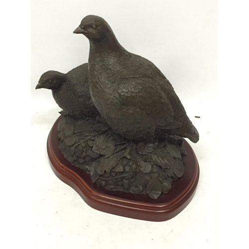 64 - A RESIN FIGURE OF TWO PARTRIDGES BY A.HAYMAN