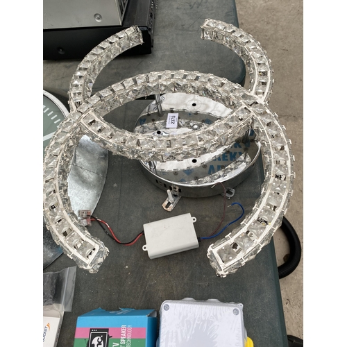 2375 - A LIGHT FITTING, A WALL CLOCK AND AN ASSORTMENT OF ELECTRIC JUNCTION BOXES ETC