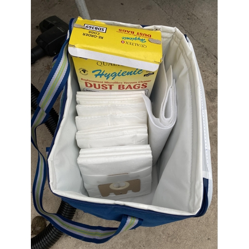 2376 - TWO VACUUM CLEANERS TO INCLUDE A MIELE AND A RUSSELL HOBBS AND AN ASSORTMENT OF ATTATCHMENTS