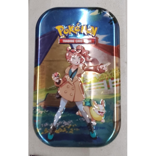 265 - TWO TINS OF POKEMON CARDS TO INCLUDE SHINIES, ETC - 100+