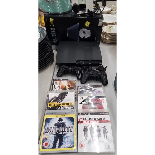 271 - A PS3 GAMES CONSOLE WITH 2 CONTROLLERS AND SIX GAMES TO INCLUDE GRAN TURISMO 5 CALL OF DUTY, OPERATI... 