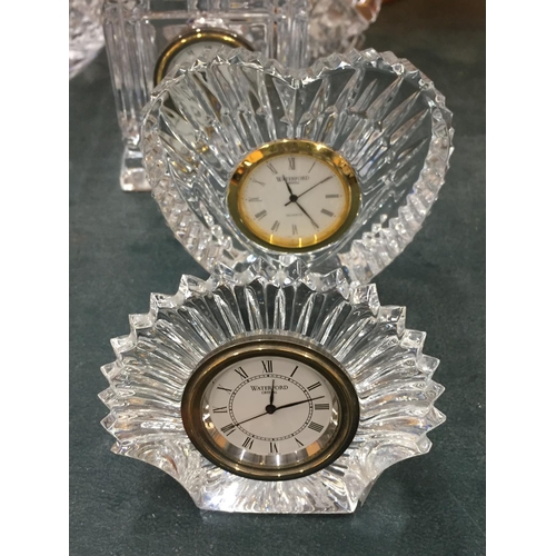 867 - THREE WATERFORD CRYSTAL MINIATURE CLOCKS, WATERFORD PAIR OF CANDLESTICKS AND CARNIVAL GLASS DISHES