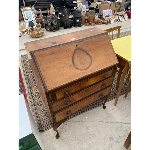 2907 - A MID 20TH CENTURY WALNUT BUREAU ON CABRIOLE LEGS, 29.5