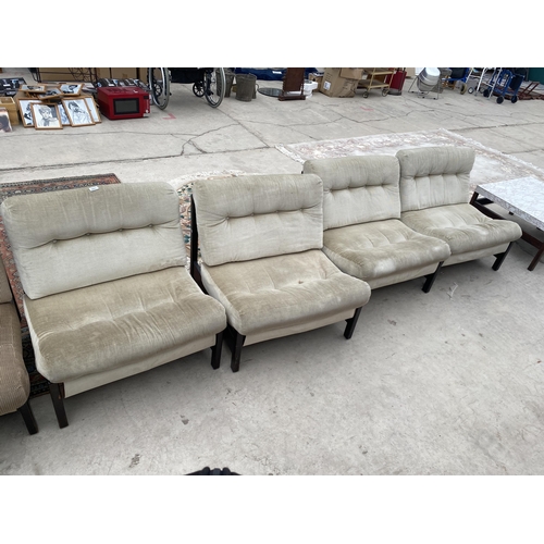 2911 - FOUR RETRO 1970'S LOW FIRESIDE CHAIRS