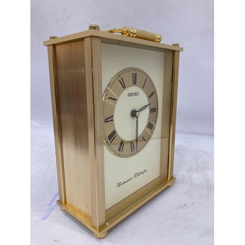 214 - A VINTAGE SEIKO WESTMINSTER WHITTINGTON QUARTZ BRASS ALARM MANTLE CLOCK, HEIGHT 21CM