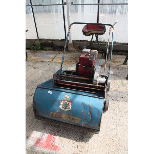 107 - A CLIO REGINA LAWN MOWER IN WORKING ORDER NO VAT