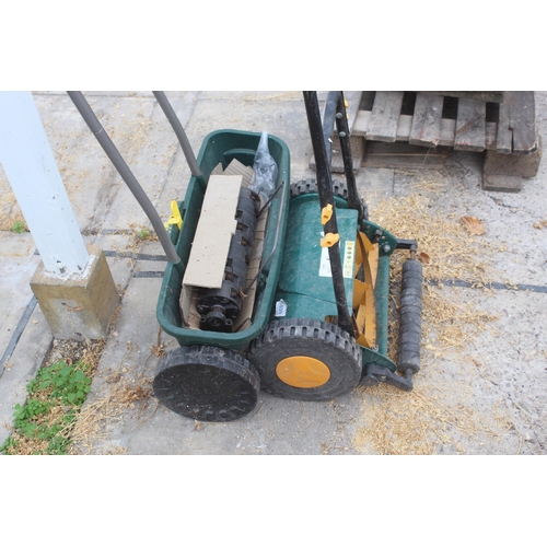 622 - A HAND MOWER & A HAND SEED SOWER NO VAT