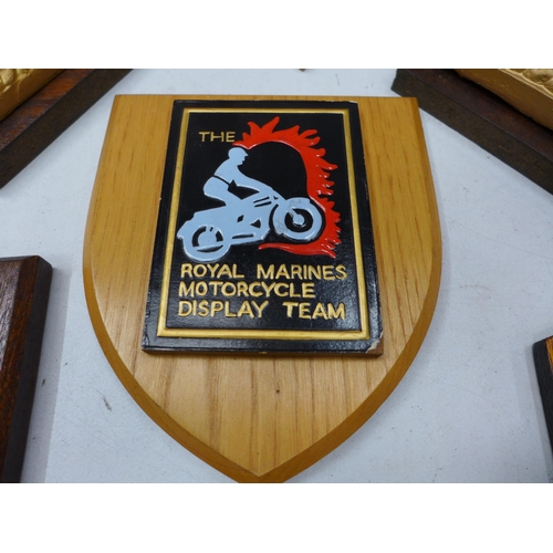 406 - SEVEN ROYAL NAVAL AND ROYAL MARINES WALL PLAQUES TO INCLUDE HMS EXCELLENT, HMS VICTORY AND TWO BOOKS