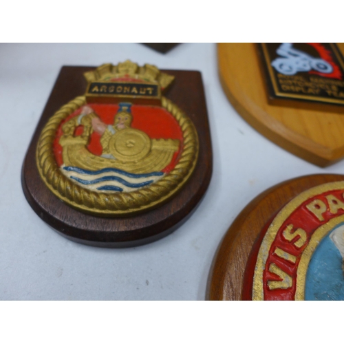 406 - SEVEN ROYAL NAVAL AND ROYAL MARINES WALL PLAQUES TO INCLUDE HMS EXCELLENT, HMS VICTORY AND TWO BOOKS