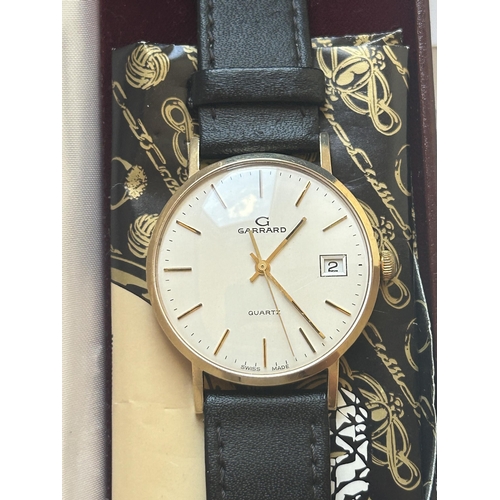 512 - A 9CT GOLD GARRARD GENTS WRIST WATCH WITH LEATHER STRAP AND ORIGINAL BOX AND PAPERS, WATCH NUMBER PR... 