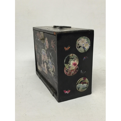 436 - A JAPANESE LACQUERED AND MOTHER OF PEARL DESIGN JEWELLERY BOX