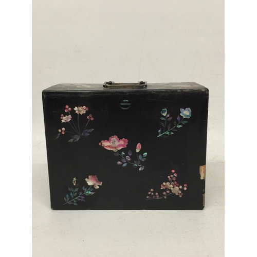 436 - A JAPANESE LACQUERED AND MOTHER OF PEARL DESIGN JEWELLERY BOX