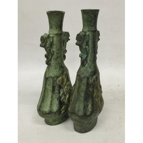 447 - A PAIR OF ORIENTAL BRONZE DRAGON VASES