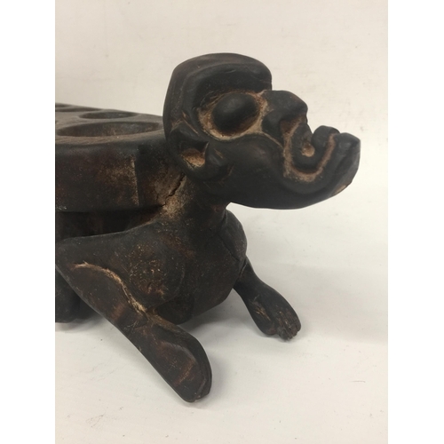 20 - AN UNUSUAL TRIBAL WOODEN FIGURAL BALL STAND