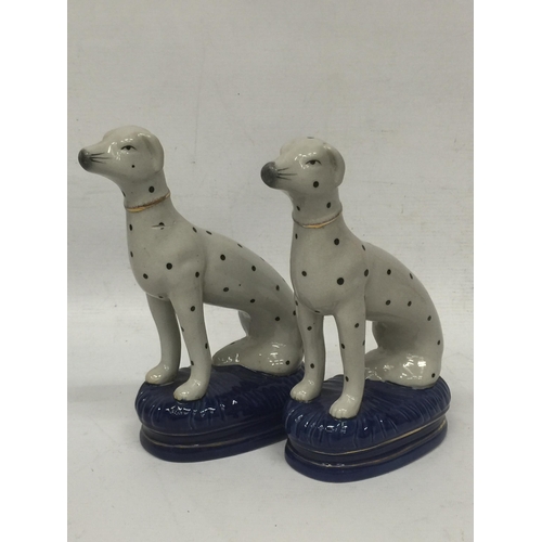 29 - A PAIR OF STAFFORDSHIRE DALMATION ANIMAL FIGURES