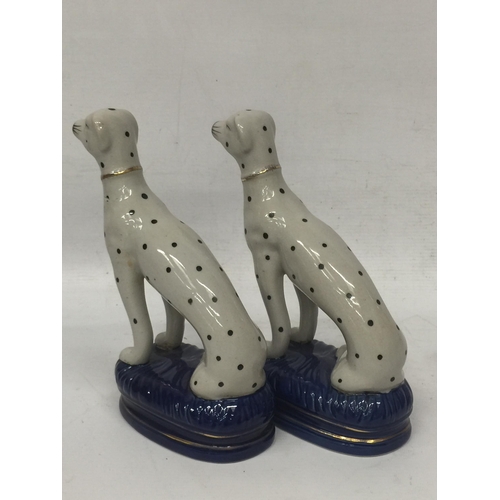 29 - A PAIR OF STAFFORDSHIRE DALMATION ANIMAL FIGURES