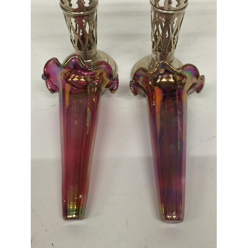 3 - A PAIR OF CHESTER HALLMARKED SILVER BUD VASES WITH PINK LUSTRE EFFECT GLASS LINERS