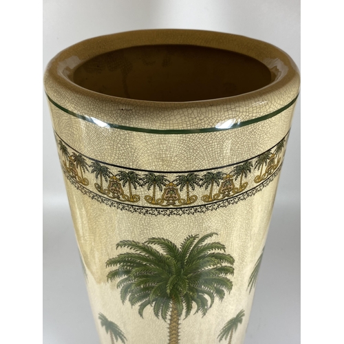 109 - A LARGE ORIENTAL STONEWARE STICK STAND WITH PALM TREE DESIGN, HEIGHT 45CM