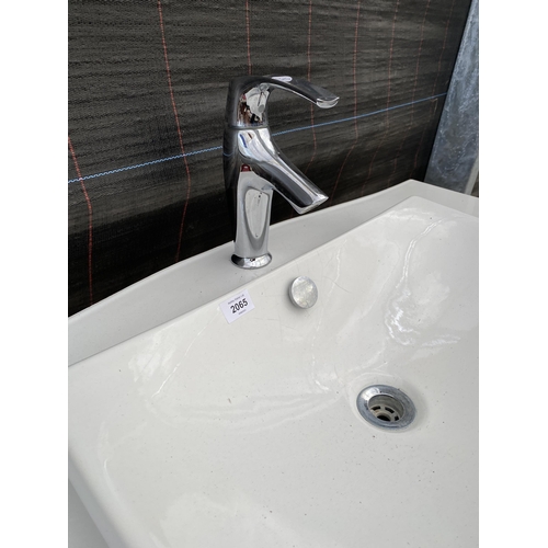 2065 - A WHITE CERAMIC SINK UNIT WITH CHROME TAP