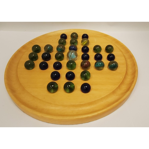 198 - A LARGE WOODEN SOLITAIRE WITH VINTAGE MARBLES