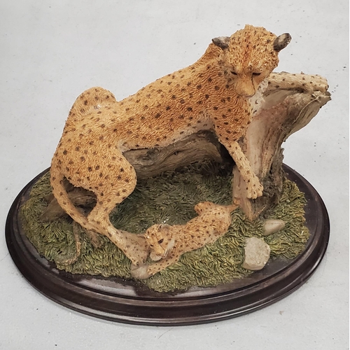 235 - A COLLECTION OF ANIMAL FIGURES TO INCLUDE TAWNY OILS, WOLVES, BIRDS AND A LEOPARD