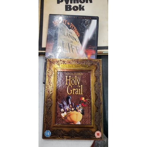 247 - TWO VINTAGE MONTY PYTHON BOOKS AND TWO DVDS