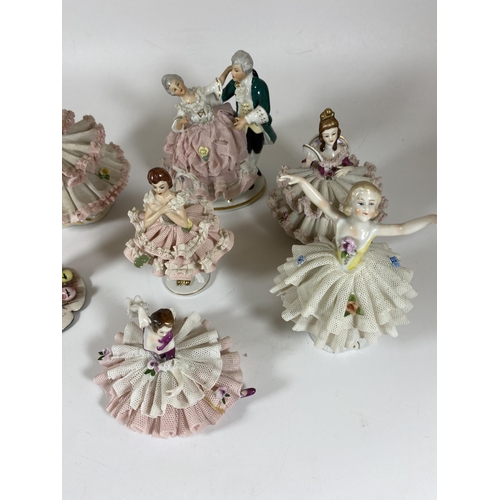 114 - A COLLECTION OF VINTAGE DRESDEN LACE CONTINENTAL FIGURES