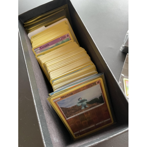 117 - A TRAINER BOX OF ASSORTED POKEMON CARDS, GAME TOKENS, HOLOS ETC