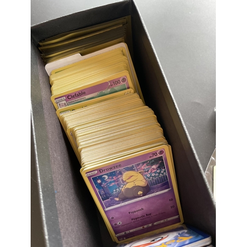 117 - A TRAINER BOX OF ASSORTED POKEMON CARDS, GAME TOKENS, HOLOS ETC