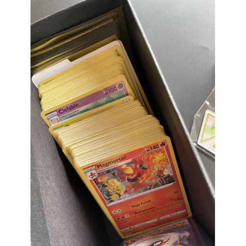 117 - A TRAINER BOX OF ASSORTED POKEMON CARDS, GAME TOKENS, HOLOS ETC