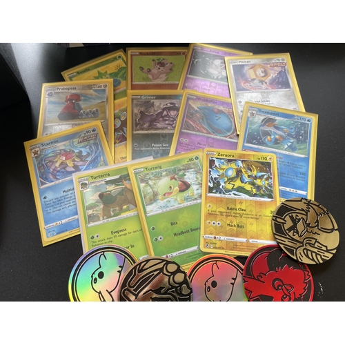 119 - A TRAINER BOX OF ASSORTED POKEMON CARDS, GAME TOKENS, HOLOS ETC