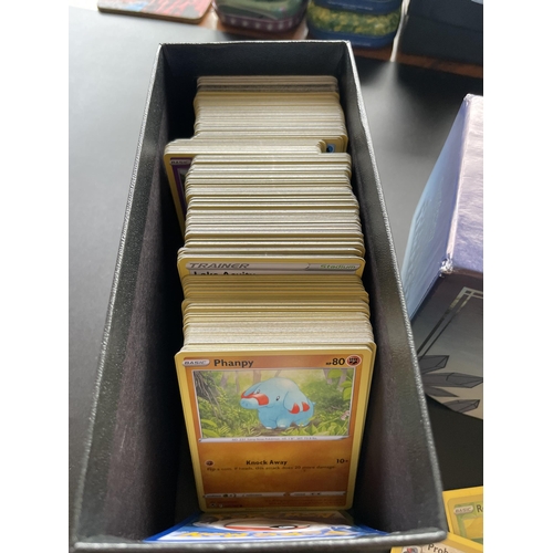 119 - A TRAINER BOX OF ASSORTED POKEMON CARDS, GAME TOKENS, HOLOS ETC