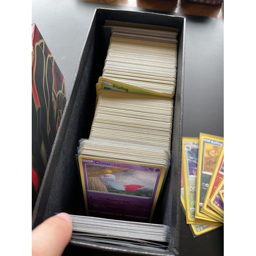 314 - A TRAINER BOX OF ASSORTED POKEMON CARDS, HOLOS, TOKENS ETC