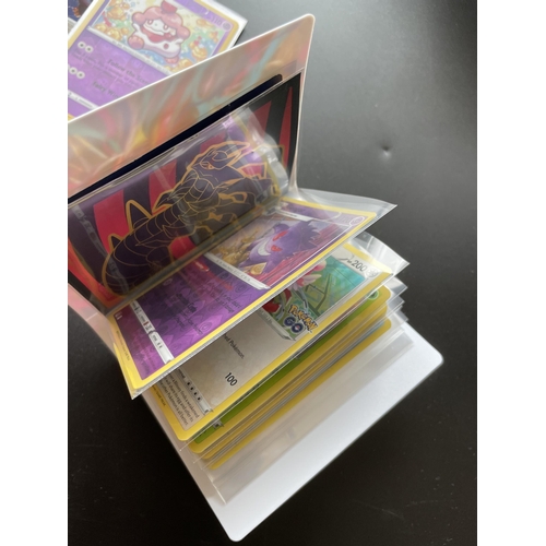 316 - TWO TINS OF ASSORTED POKEMON CARDS, HOLOS, SMALL FOLDER OF CARDS ERC