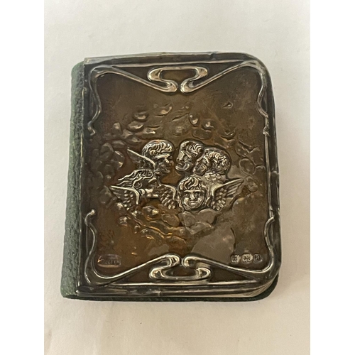 83 - A COMMON PRAYER BOOK WITH A HALLMARKED BIRMINGHAM SILVER FRONT COVER