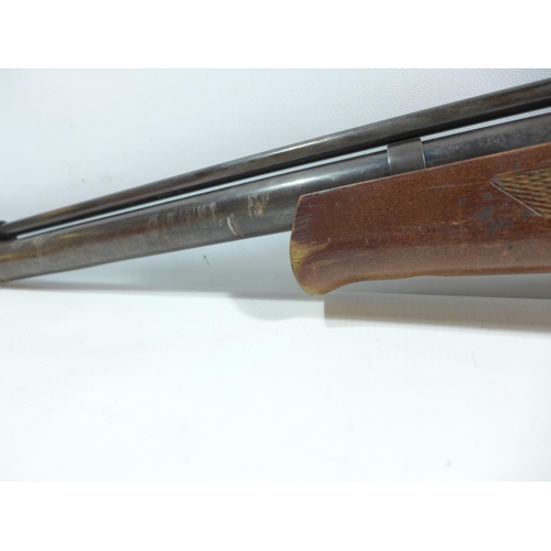 431 - A FALCON .22 CALIBRE AIR RIFLE AND SILENCER, LENGTH OF BARREL 52CM, SERIAL NUMBER 97564, LENGTH 111C... 