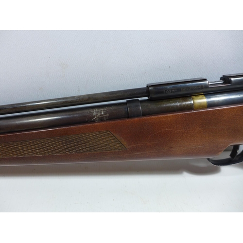 431 - A FALCON .22 CALIBRE AIR RIFLE AND SILENCER, LENGTH OF BARREL 52CM, SERIAL NUMBER 97564, LENGTH 111C... 